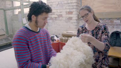 Isaac & Lara inspecting the scoured fleece